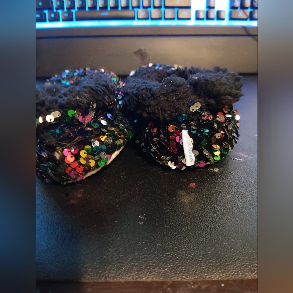 A pair of sparkly women's slippers